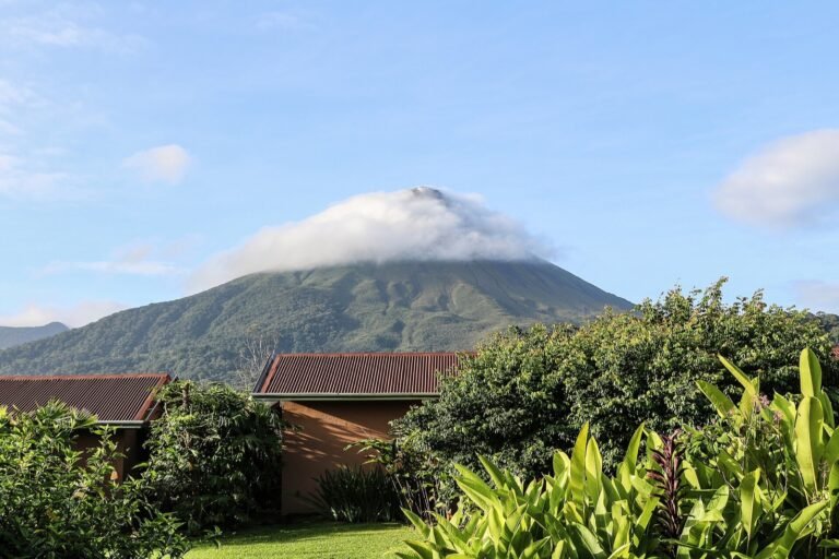 Arenal Volcano rising above green forest near La Fortuna, Costa Rica